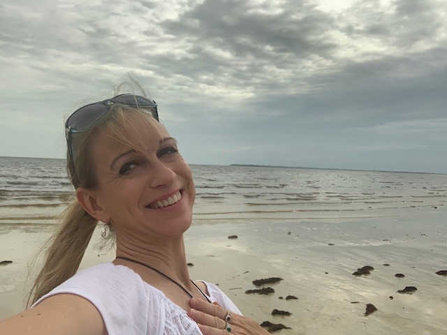 Michele Zirkle smiling with ocean in the background photo